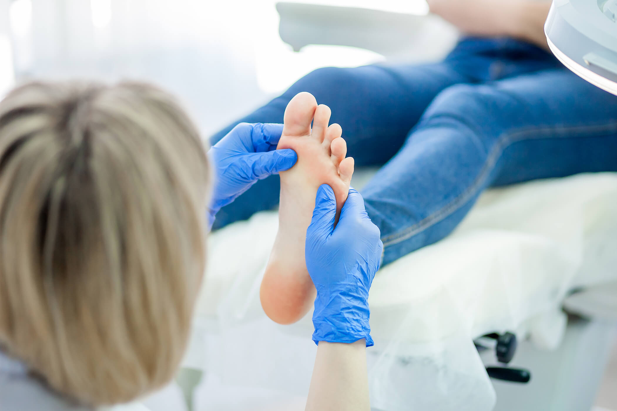 Podiatrist Checking Patients Foot